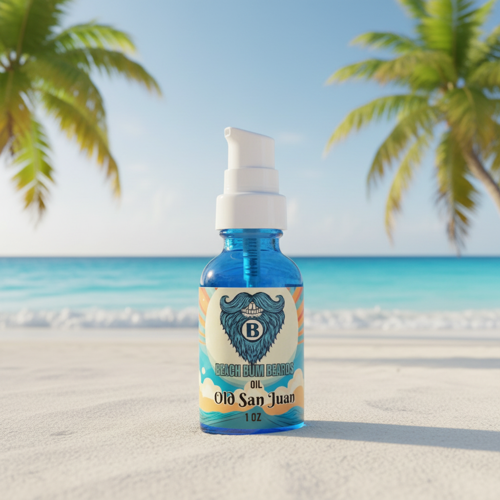A small blue bottle of Old San Juan Beach Balm Balm Oil with a white pump dispenser, set on a sandy beach with a blurred ocean and palm tree background.